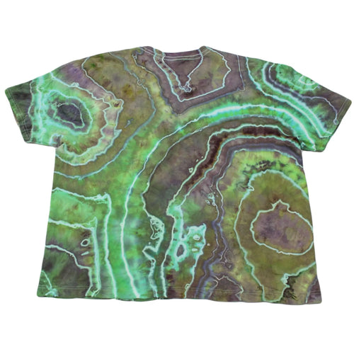Back view of a green and purple geode tie-dye t-shirt by Regular Magic displaying intricate concentric dye rings.