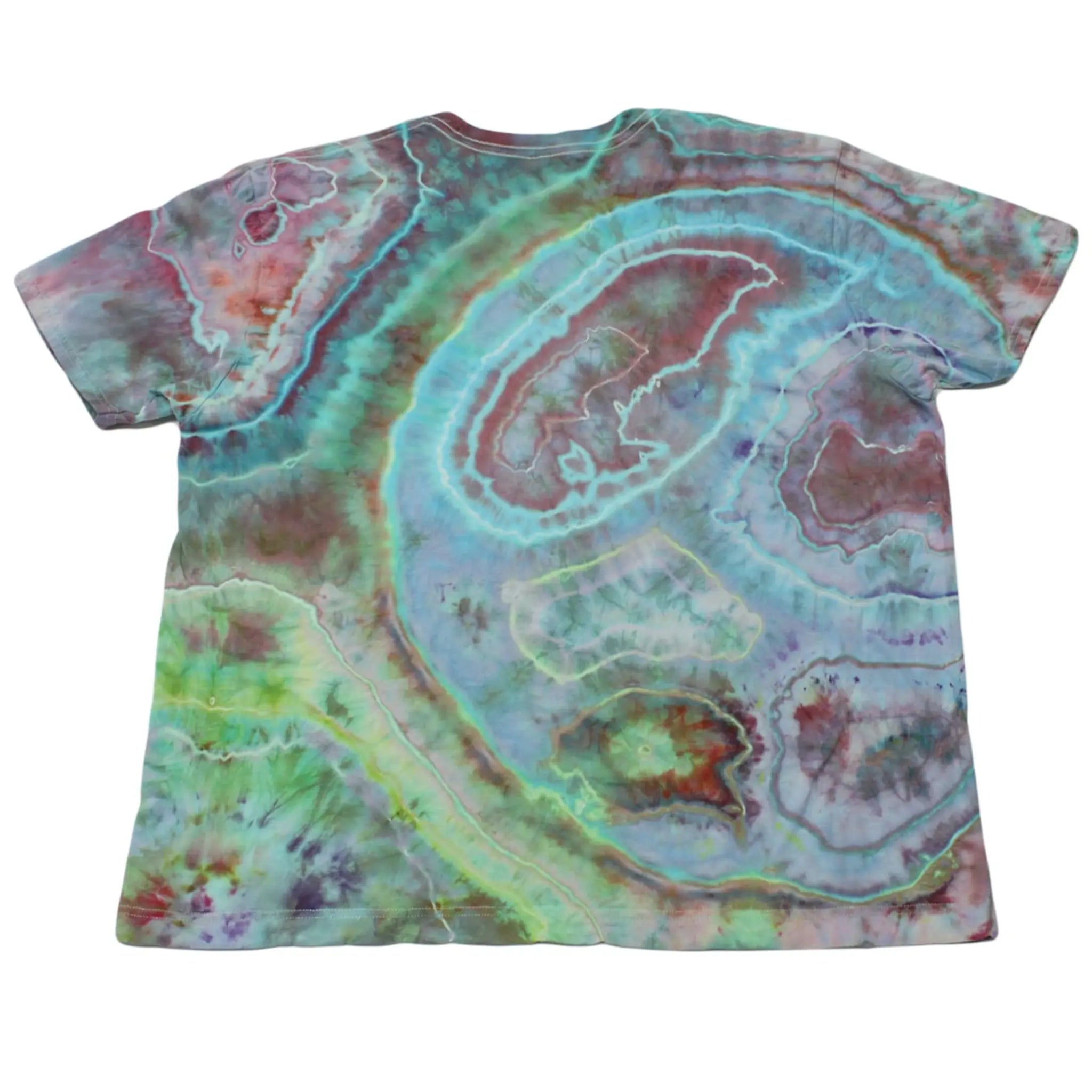 Back view of a teal, magenta, and seafoam Chaos Magic geode tie-dye t-shirt by Regular Magic featuring flowing organic dye rings.