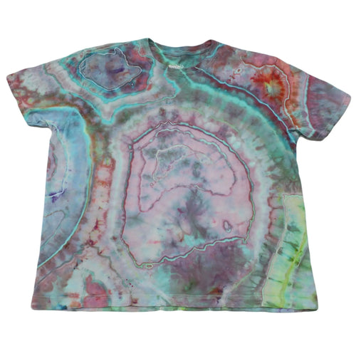 Front view of a teal, magenta, and seafoam Chaos Magic geode tie-dye t-shirt by Regular Magic with custom geode dye ring patterns across the chest.