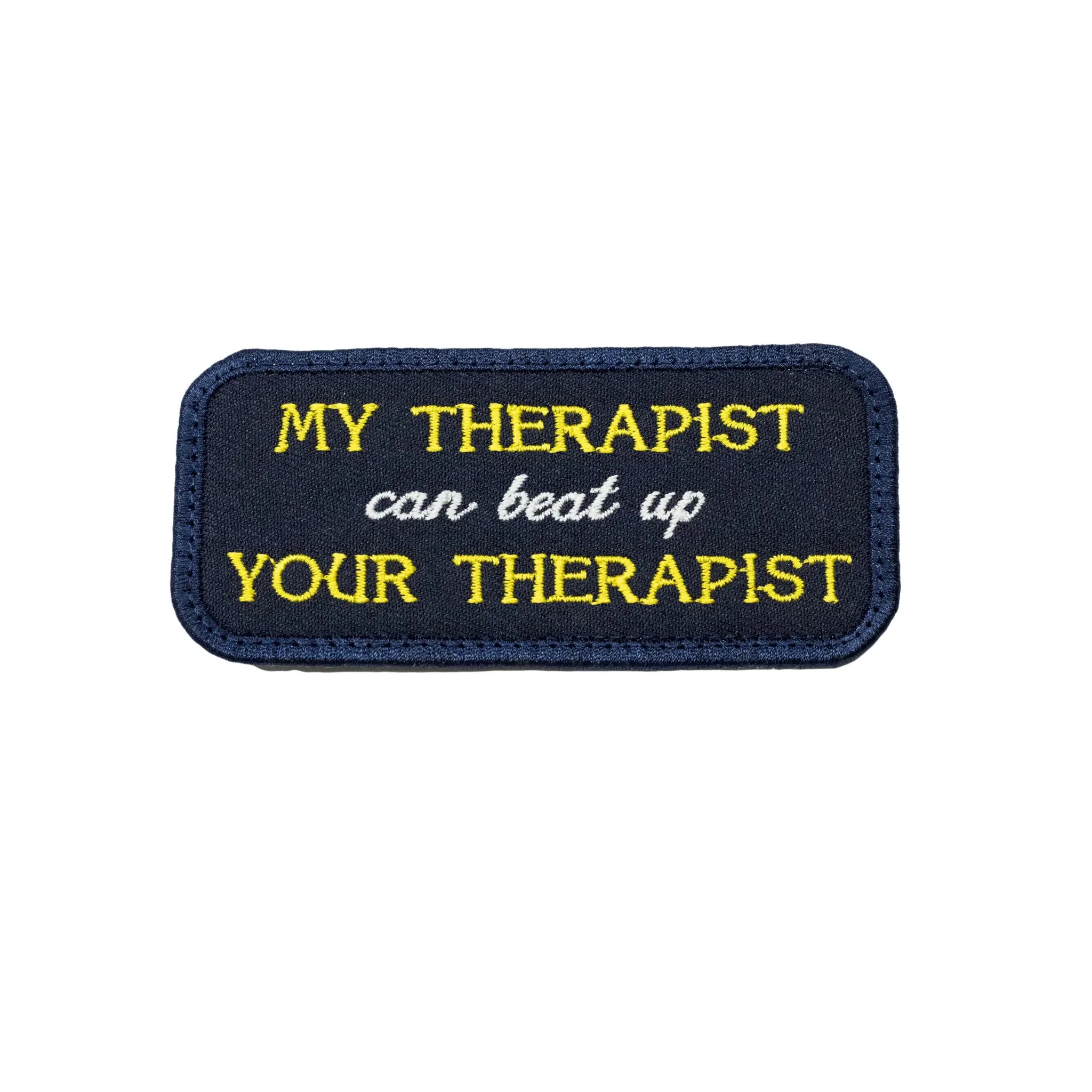 Dark blue rectangular embroidered patch by Regular Magic featuring the text 'MY THERAPIST can beat up YOUR THERAPIST' stitched in yellow and white lettering.